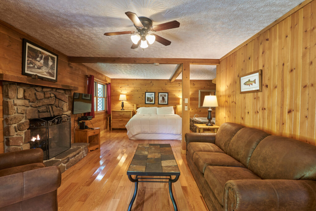 Interior of a one-bedroom log cabin in West Virginia.