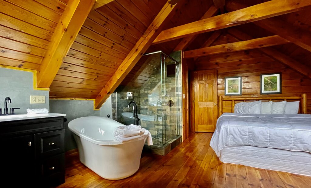 Tub and amenities in a luxury log cabin at Harman's West Virginia.