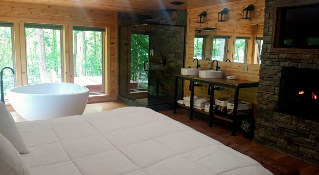 Interior of a luxury log cabin at Harman's Log Cabin Resort in West Virginia.